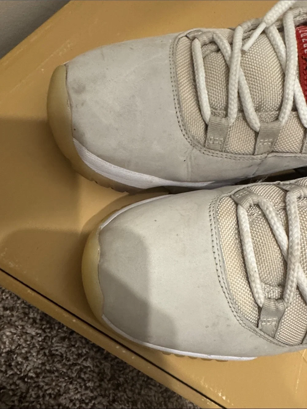 Jordan 11 Men's High-Top Sneakers in Off-White, Gum & Red Accents